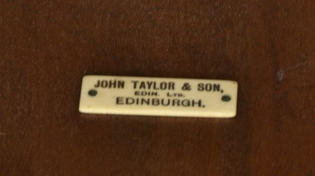 John Taylor Badge