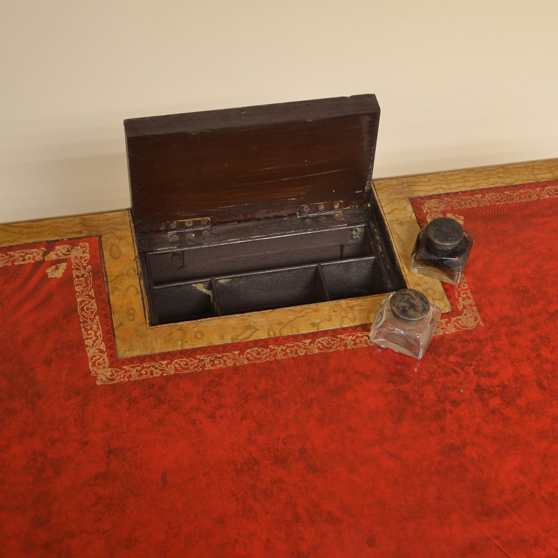 stationary compartment and two ink wells. 